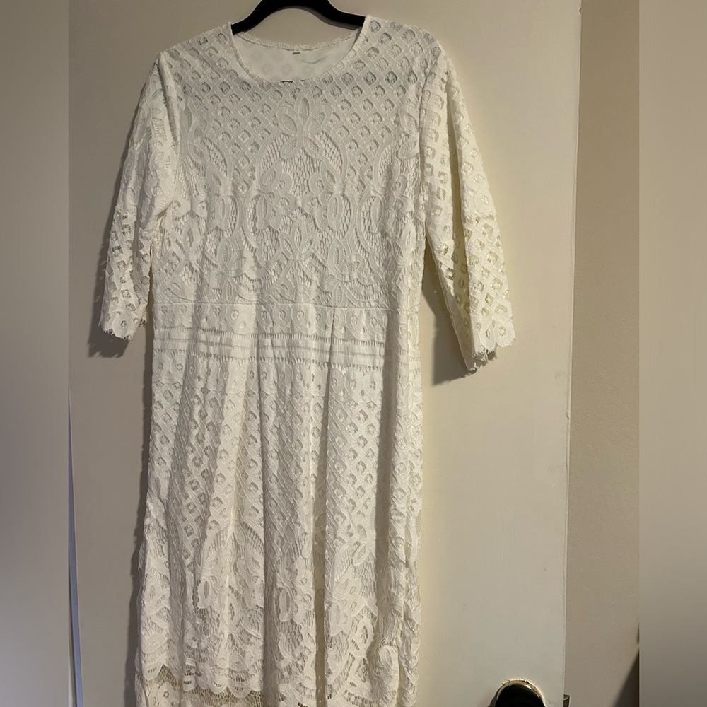 White lace with satin under cocktail dress, mid length.